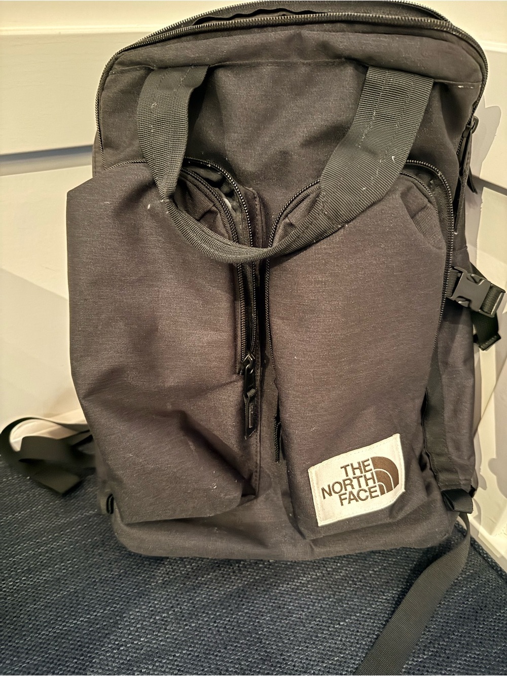 The North Face Black Canvas Backpack with Front Pocket